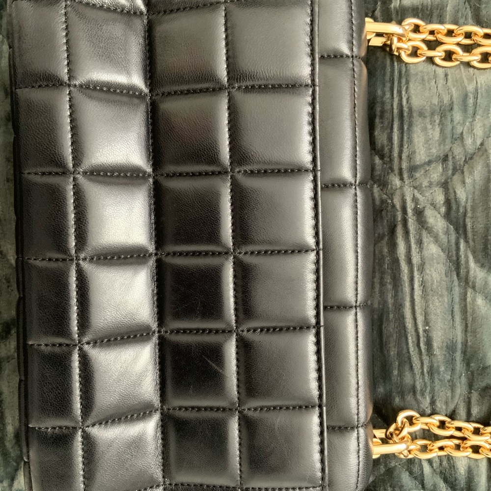 Michael Kors black and gold leather Chanel style bag.